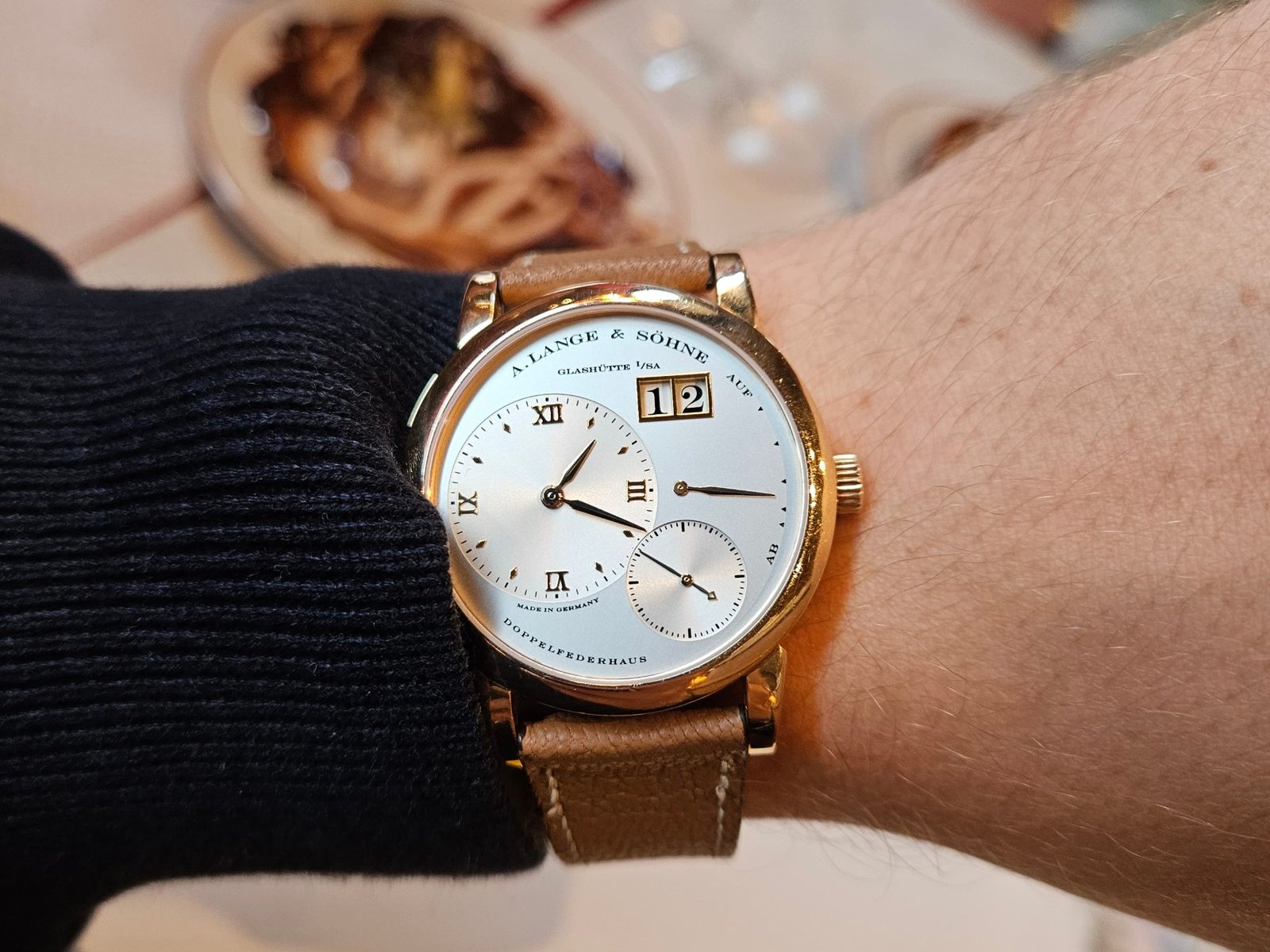 A Lange 1 on the wrist at dinner